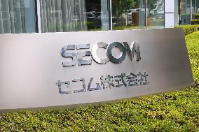 SECOM signage and logo